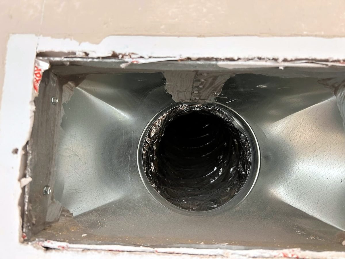Clean supply boot with flex duct after cleaning